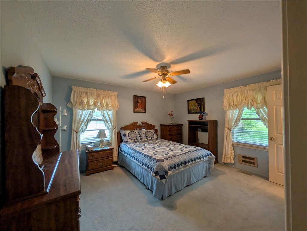 1000 Hickory Lane Anderson, SC 29624 - Photo 15 of 37 This spacious bedroom offers a tranquil retreat with ample natural light.