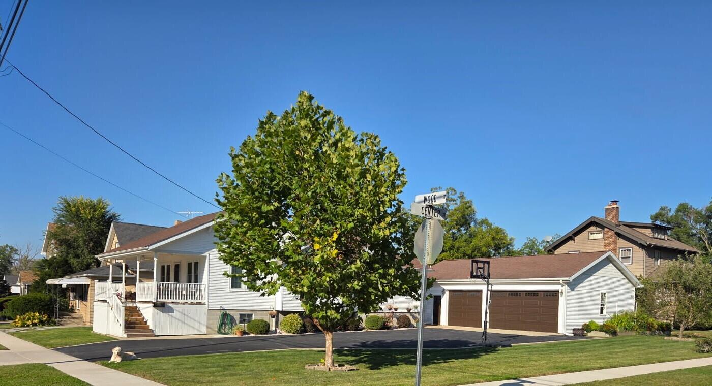 228 Wood Street Crown Point, IN 46307 - Photo 3 of 33 front view of a house with a yard