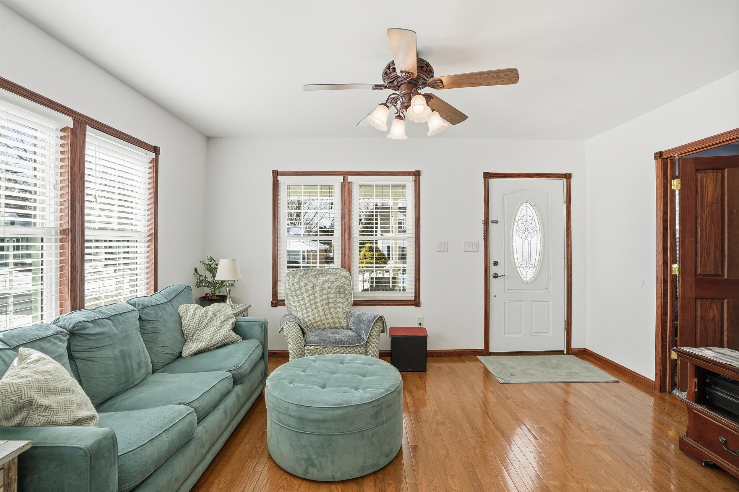 228 Wood Street Crown Point, IN 46307 - Photo 8 of 33 a living room with furniture and a large window