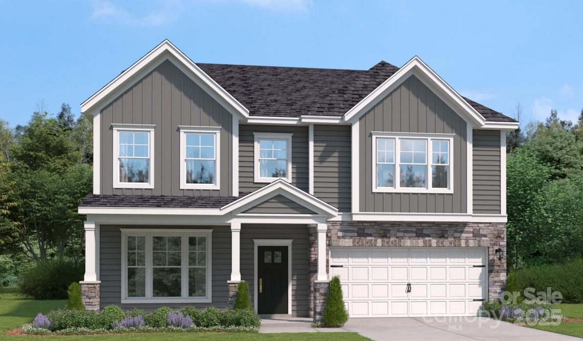 132 Balboa Street Matthews, NC 28104 - Photo 1 of 39 front view of brick house with a yard