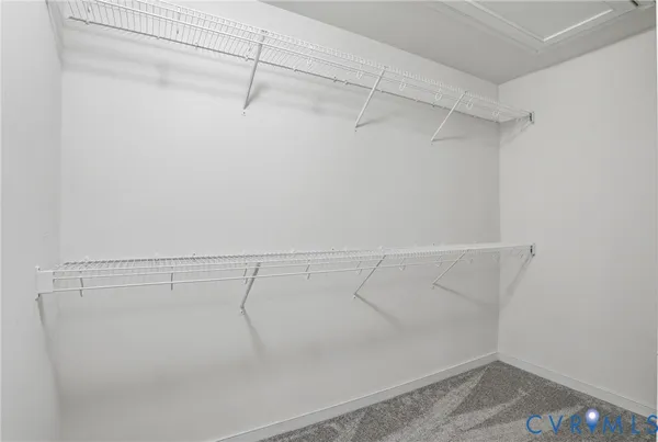 a view of a room with racks on the wall