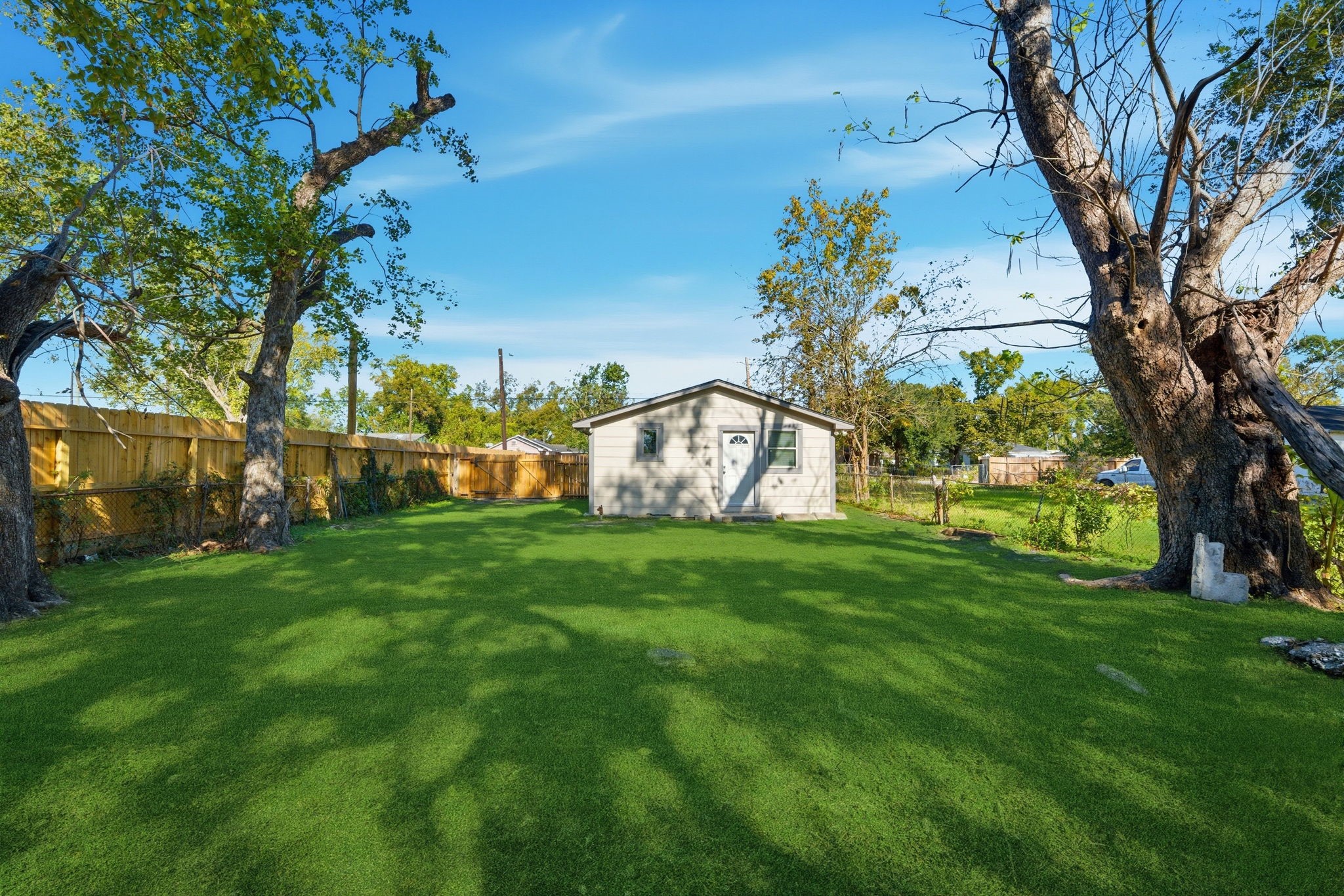 1041 Dolly Wright Street Houston, TX 77088 - Photo 12 of 12 a view of a garden with a tree