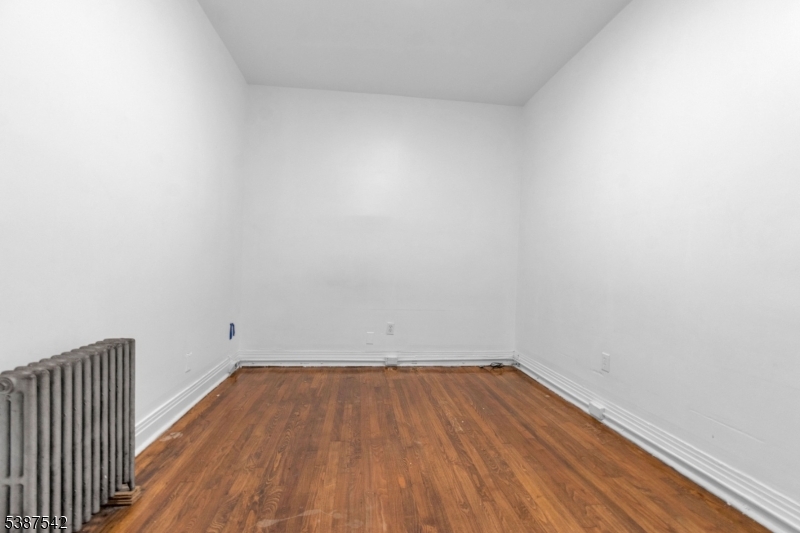 19 North 7th Street, Unit 2 Newark, NJ 07107 - Photo 11 of 21 a view of a room with wooden floor