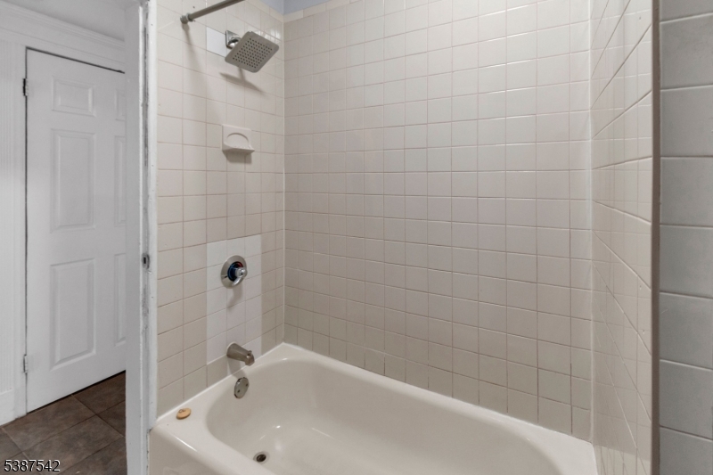 19 North 7th Street, Unit 2 Newark, NJ 07107 - Photo 5 of 21 a bathroom with a sink and shower