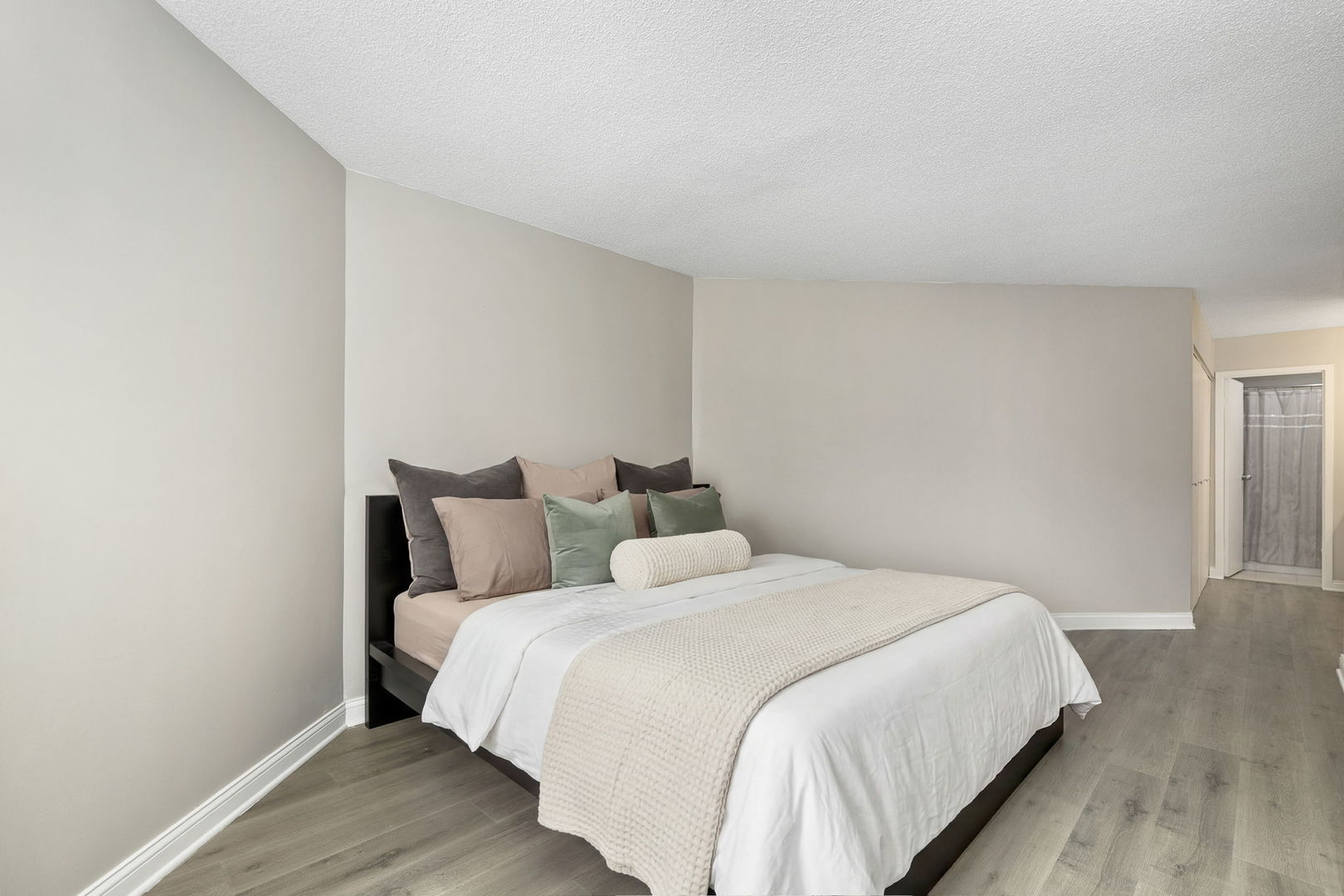 5320 North Sheridan Road, Unit 403 Chicago, IL 60640 - Photo 16 of 36 a bedroom with bed and a night stand