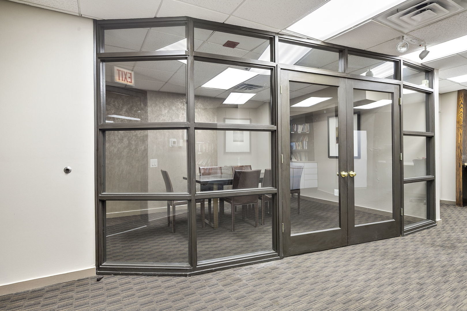 5320 North Sheridan Road, Unit 403 Chicago, IL 60640 - Photo 24 of 36 a dining room with wooden floor and a floor to ceiling window