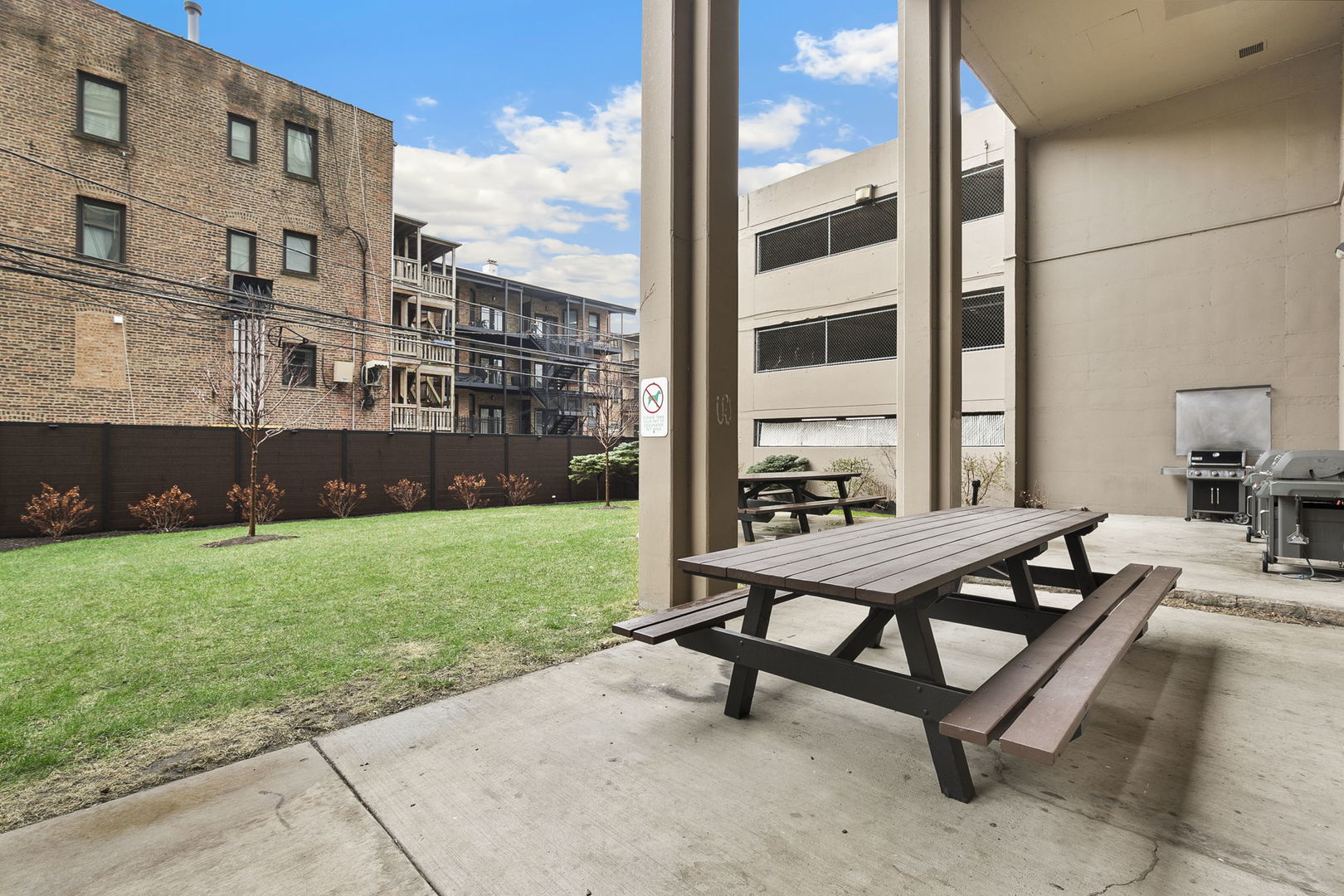 5320 North Sheridan Road, Unit 403 Chicago, IL 60640 - Photo 27 of 36 a view of a yard with a bench and floor