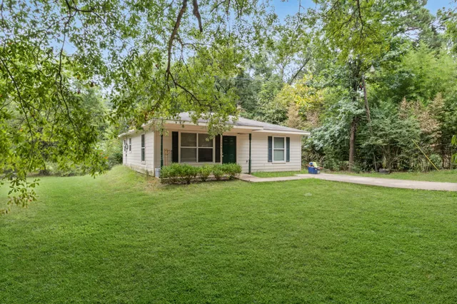 a house view with a garden space