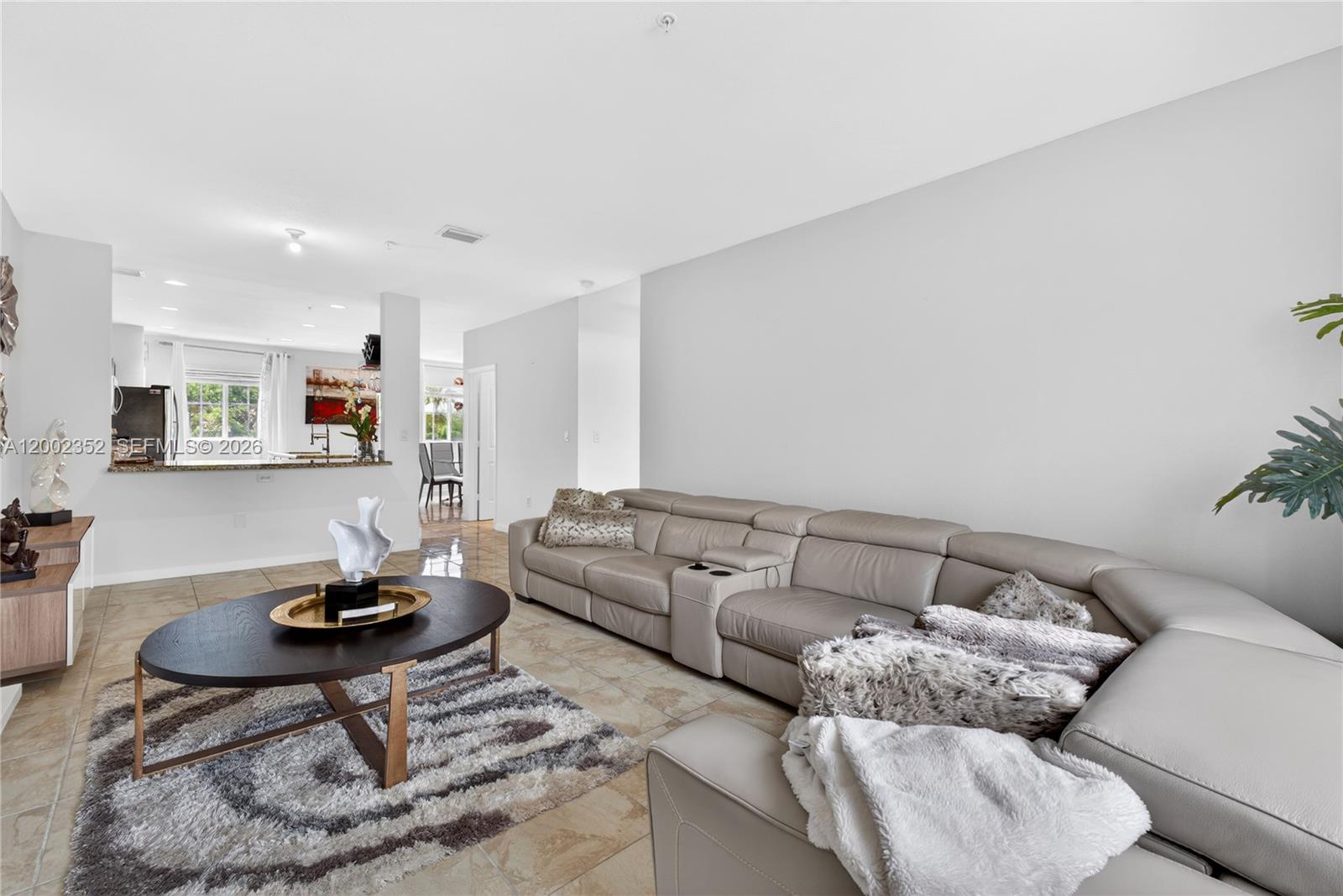 14213 Southwest 274th Street Homestead, FL 33032 - Photo 13 of 62 a living room with furniture and a couch