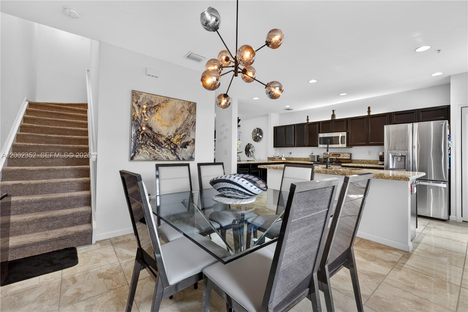 14213 Southwest 274th Street Homestead, FL 33032 - Photo 25 of 62 a dining room with furniture and window