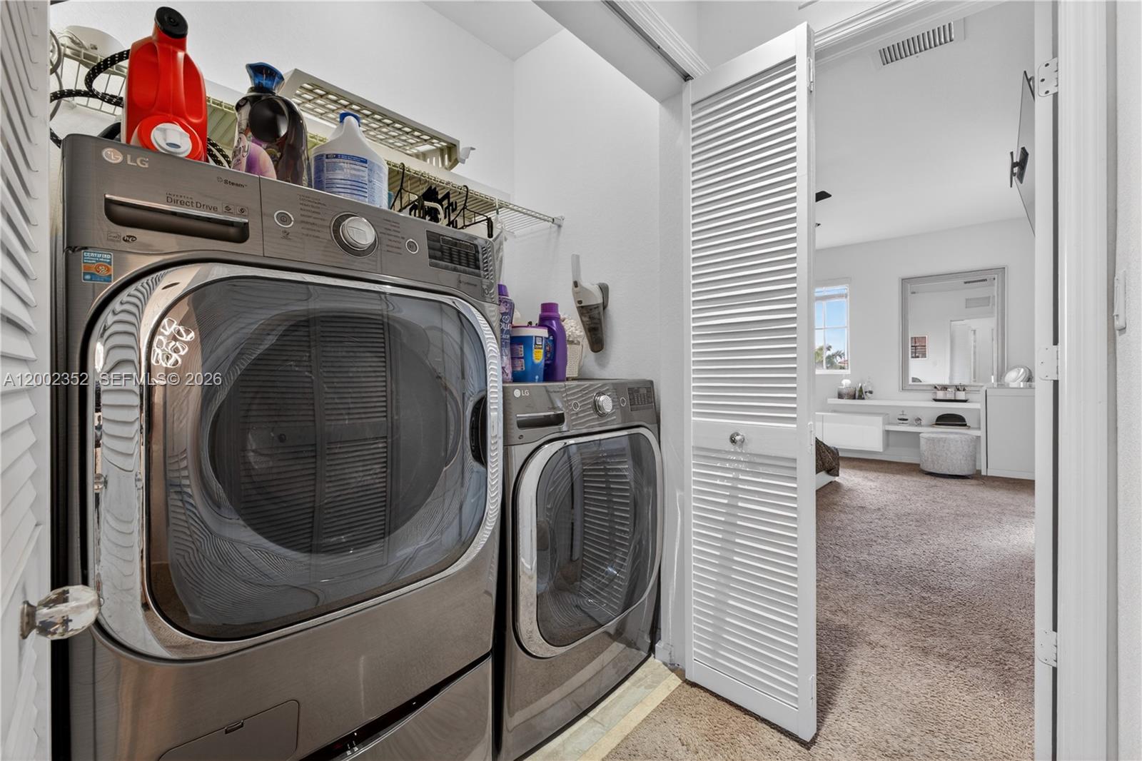 14213 Southwest 274th Street Homestead, FL 33032 - Photo 27 of 62 a utility room with dryer and washer
