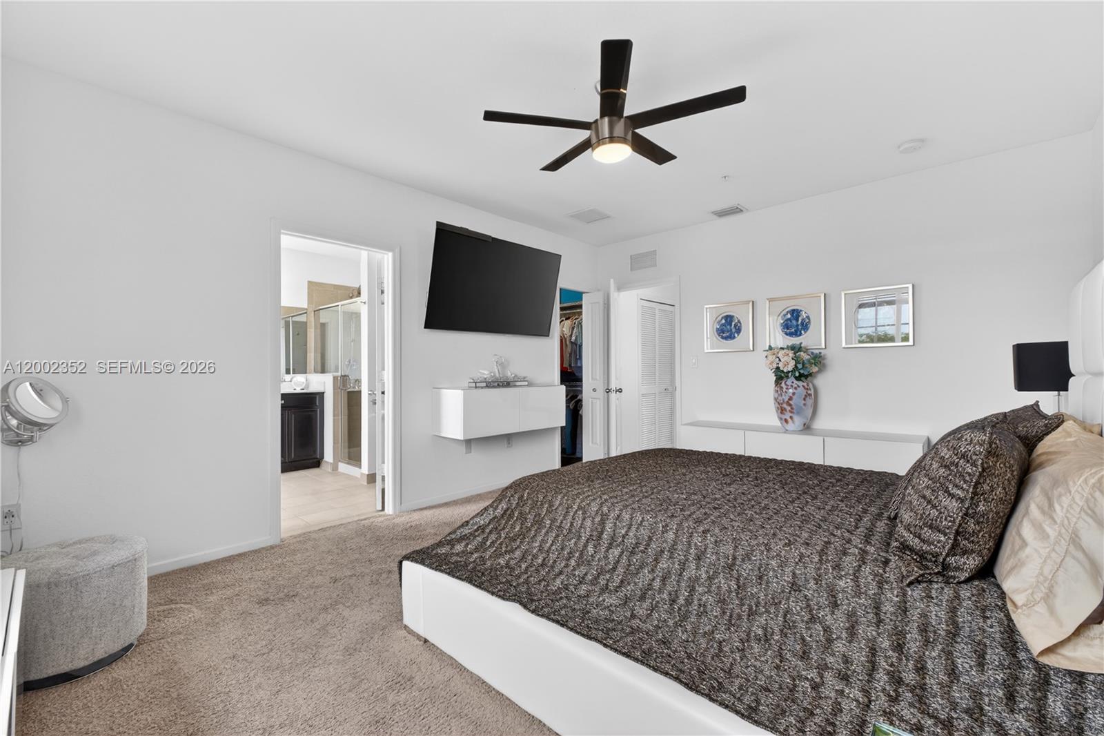 14213 Southwest 274th Street Homestead, FL 33032 - Photo 29 of 62 a living room with furniture and a flat screen tv