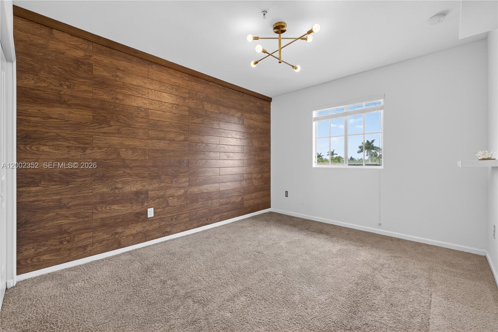 14213 Southwest 274th Street Homestead, FL 33032 - Photo 39 of 62 a view of an empty room with a window