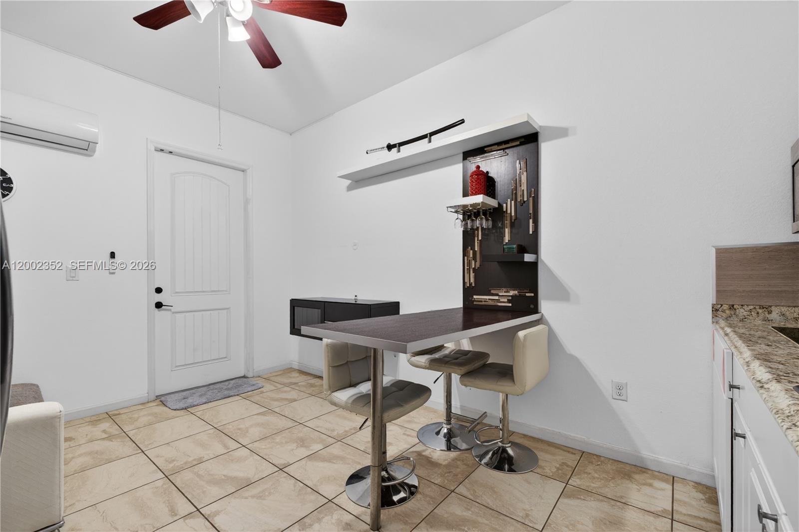 14213 Southwest 274th Street Homestead, FL 33032 - Photo 45 of 62 a view of a workspace with furniture