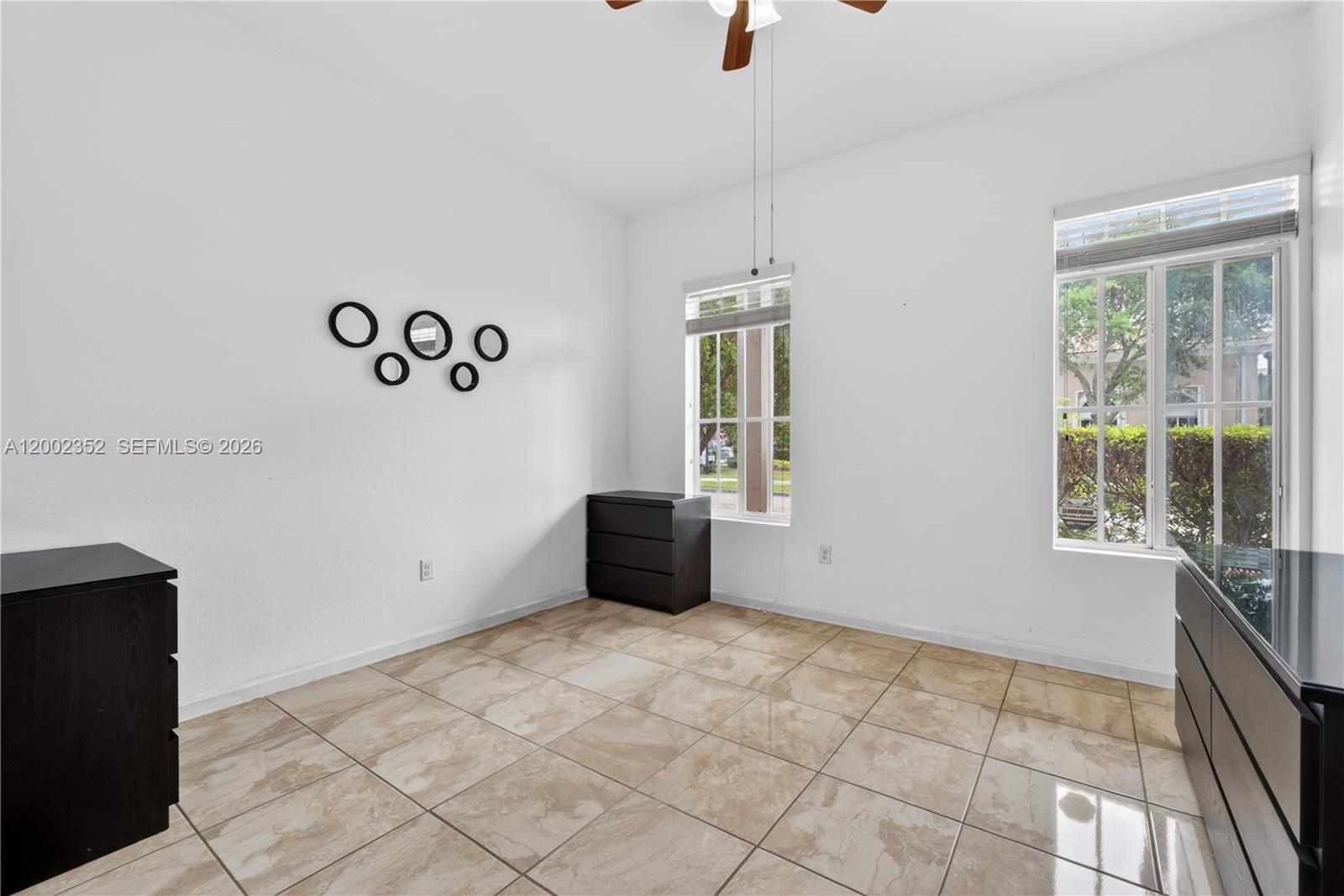 14213 Southwest 274th Street Homestead, FL 33032 - Photo 48 of 62 a view of an empty room with a window