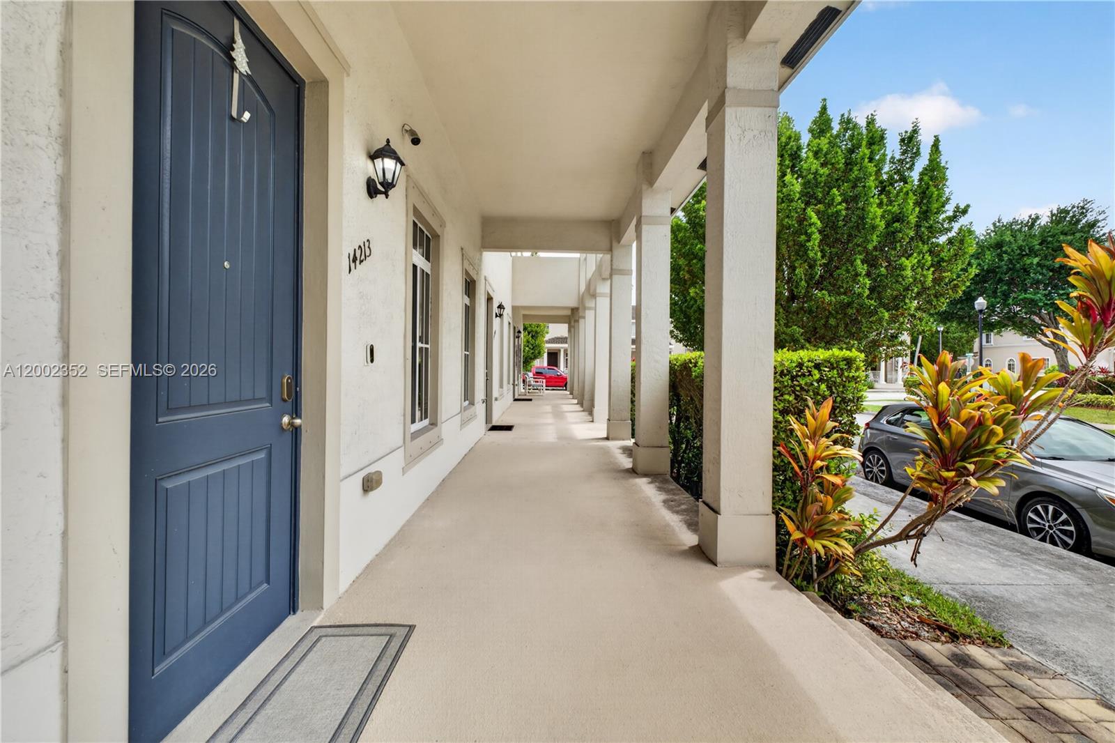 14213 Southwest 274th Street Homestead, FL 33032 - Photo 5 of 62 a view of a path along with potted plants