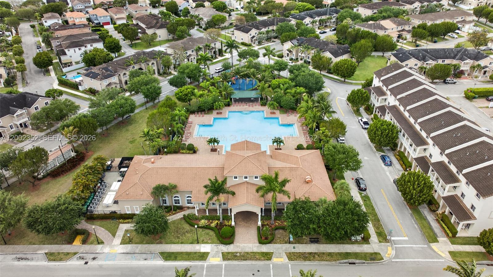 14213 Southwest 274th Street Homestead, FL 33032 - Photo 56 of 62 an aerial view of residential houses with yard