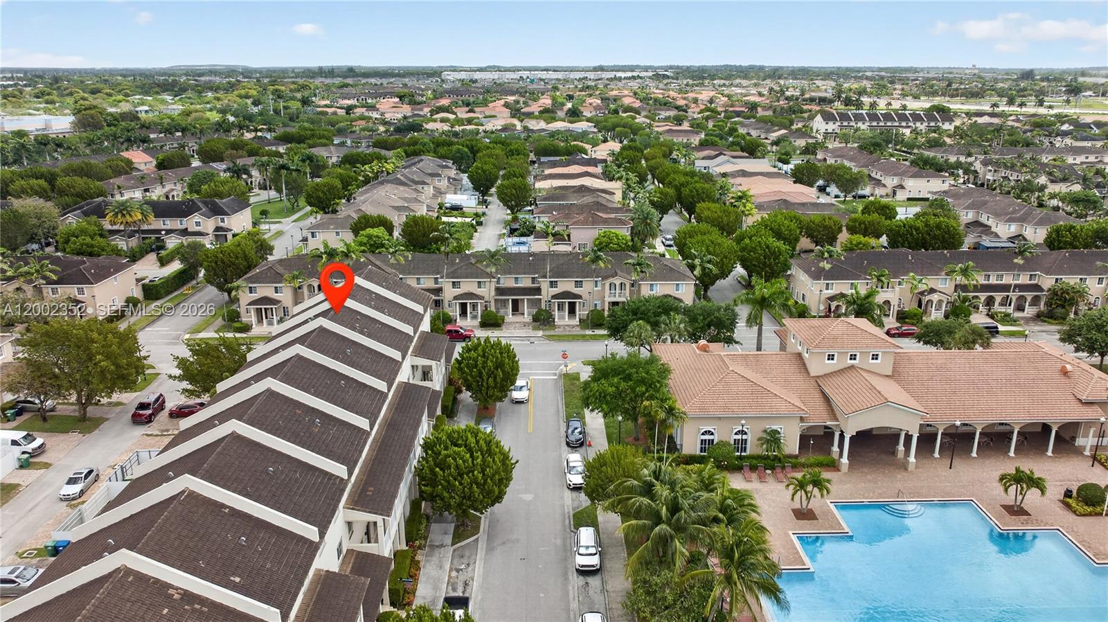 14213 Southwest 274th Street Homestead, FL 33032 - Photo 62 of 62 an aerial view of residential houses with outdoor space and parking