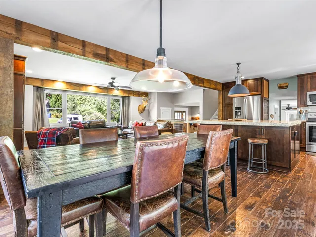 a dining room filled with furniture and window