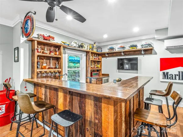 a very nice looking dining room with furniture