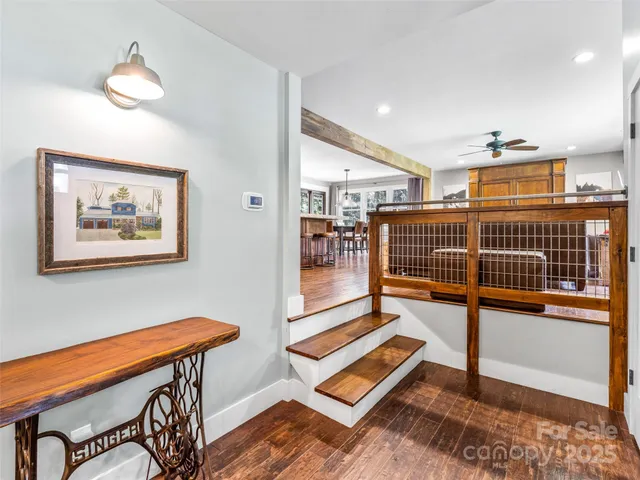 a living room with blue furniture and a table