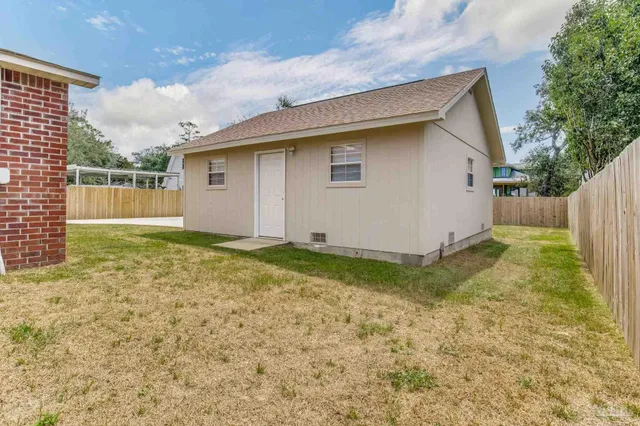 a view of backyard of house