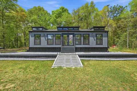 a view of a house with a swimming pool