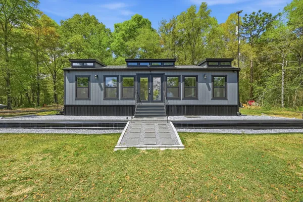 a view of a house with a swimming pool