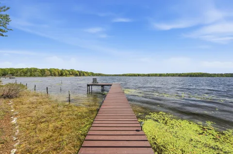 a view of lake with green space