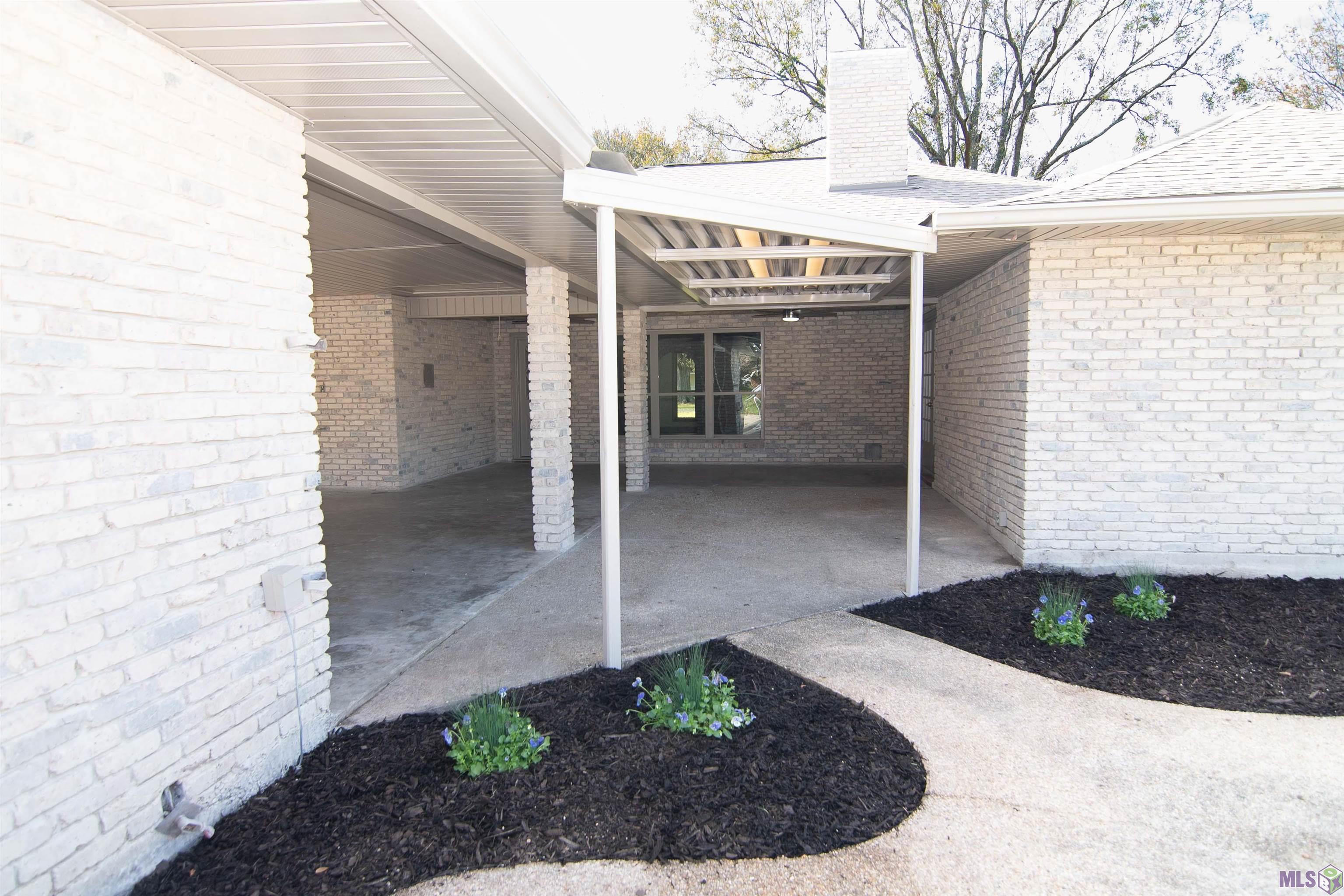 12472 Gravois Subdivision Road Gonzales, LA 70737 - Photo 17 of 37 Large covered Patio