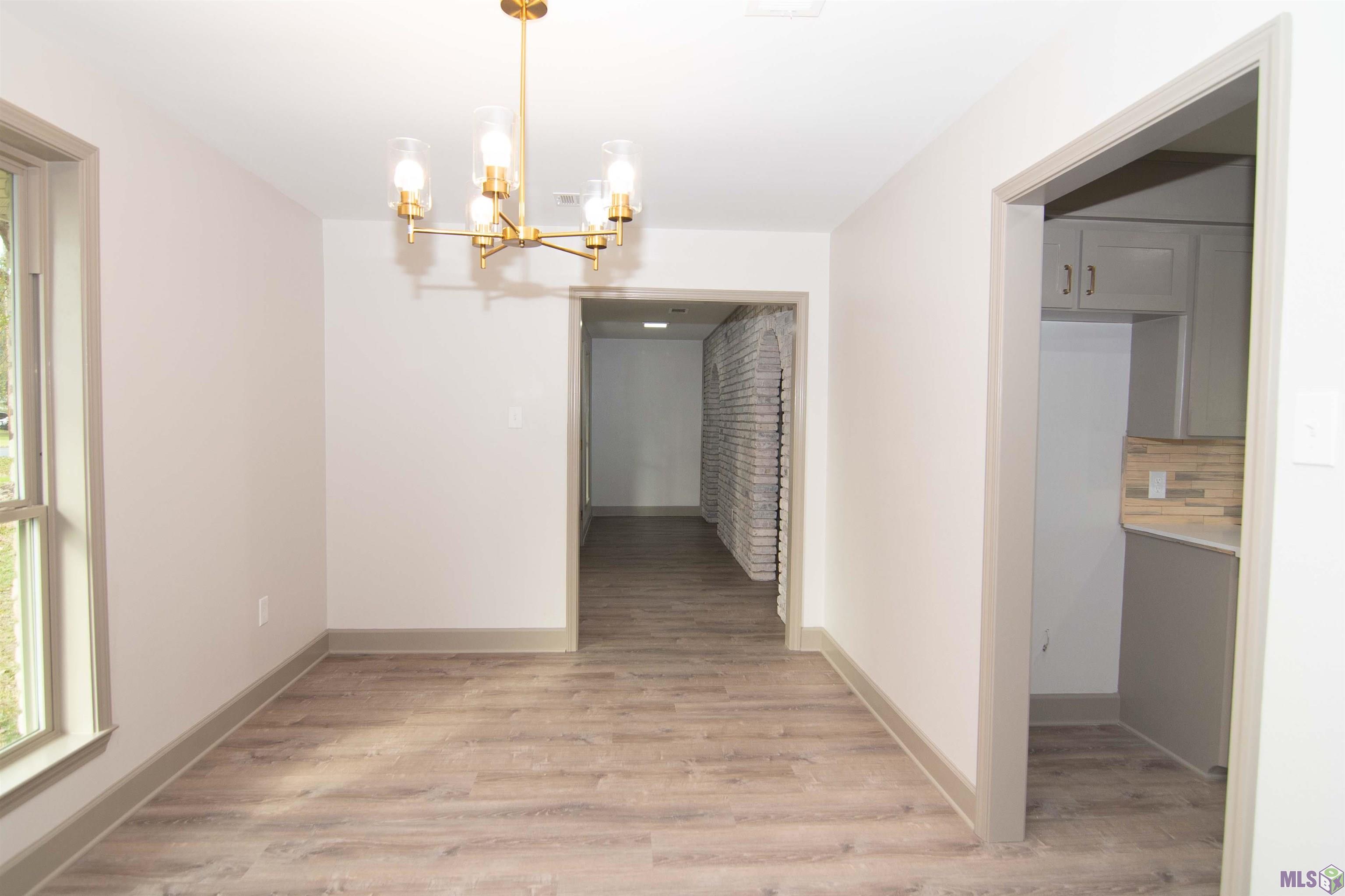 12472 Gravois Subdivision Road Gonzales, LA 70737 - Photo 21 of 37 formal dining room