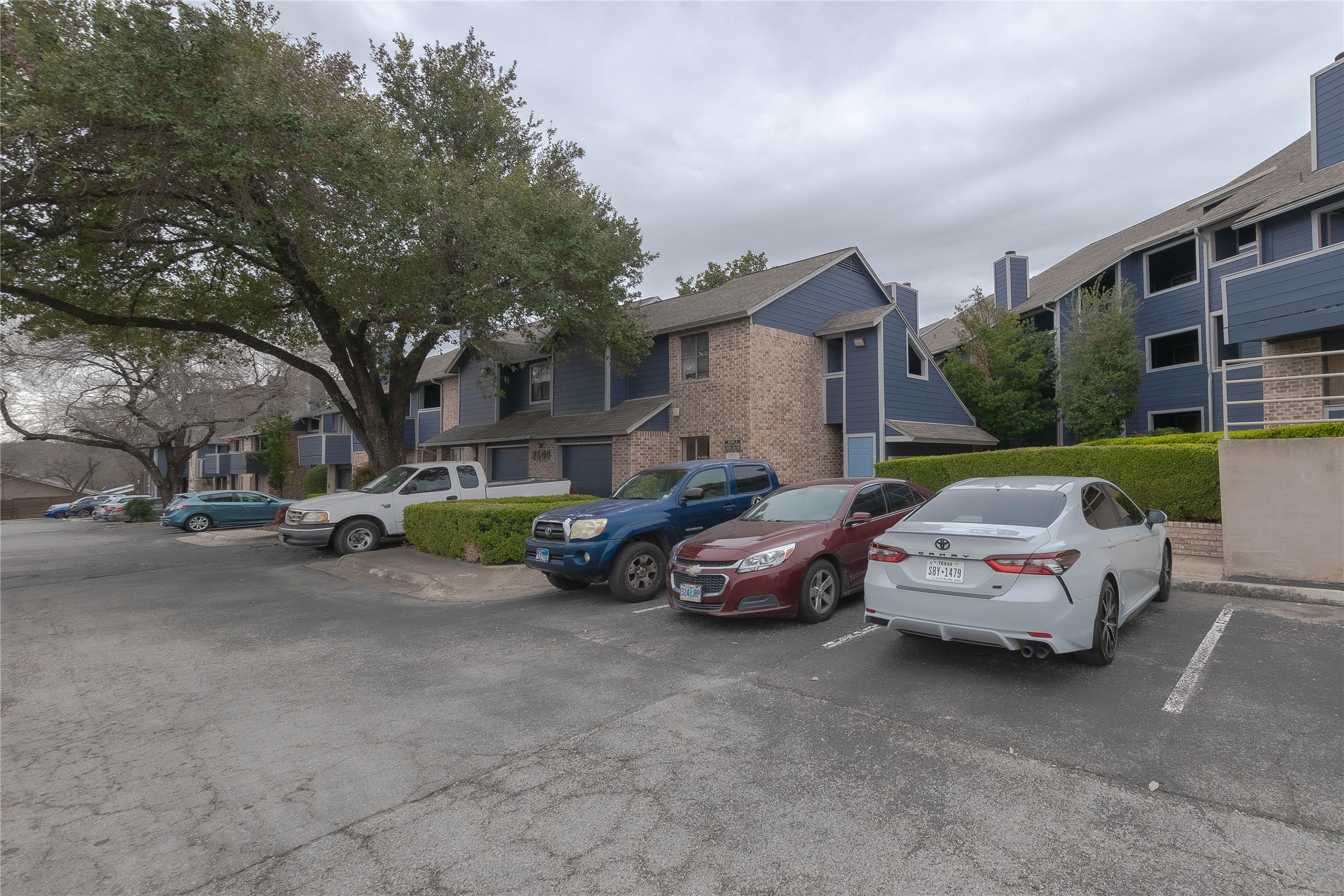 2500 Burleson Road, Unit 601 Austin, TX 78741 - Photo 19 of 20 a view of a cars parked in front of a house