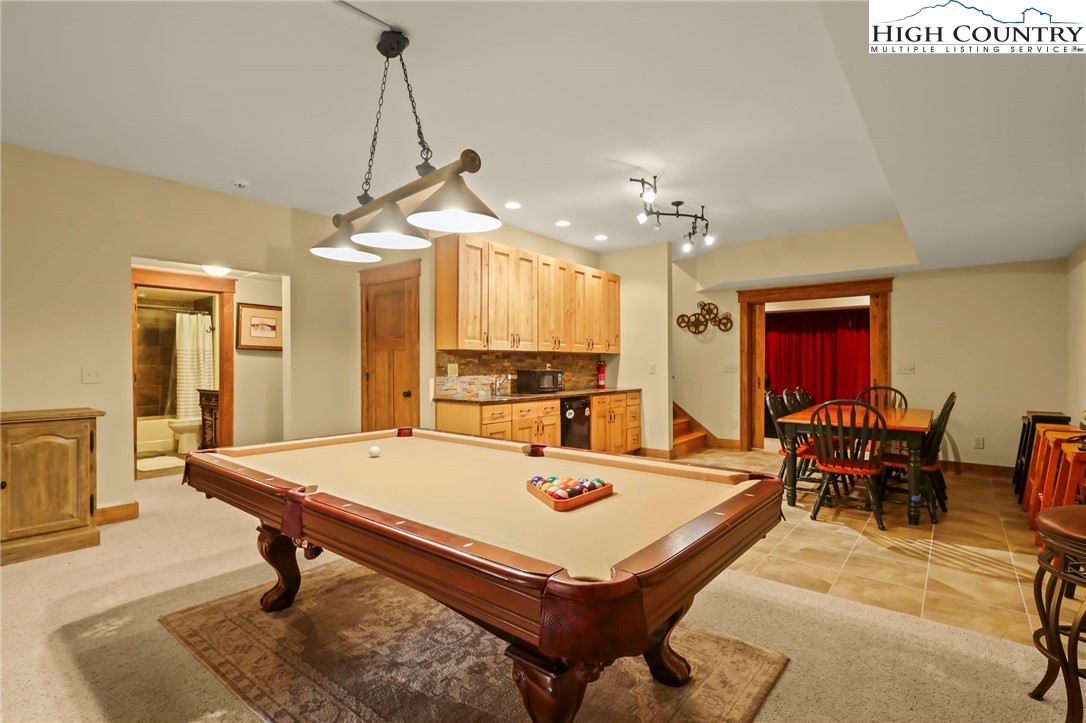 138 South Camp Road, Unit 103 Boone, NC 28607 - Photo 42 of 50 a room with pool table and windows