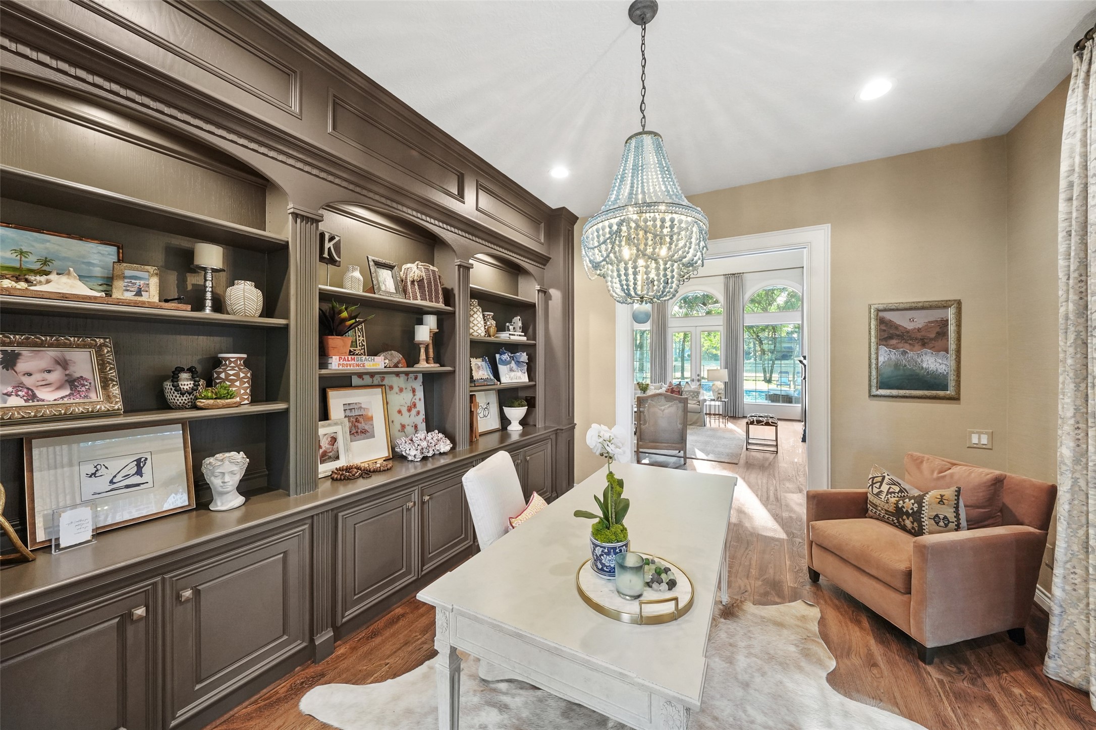 2207 Longmire Road Conroe, TX 77304 - Photo 14 of 46 a outdoor dining space with furniture and chandelier