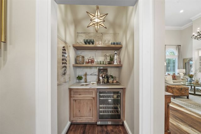 a kitchen with a cabinets and window