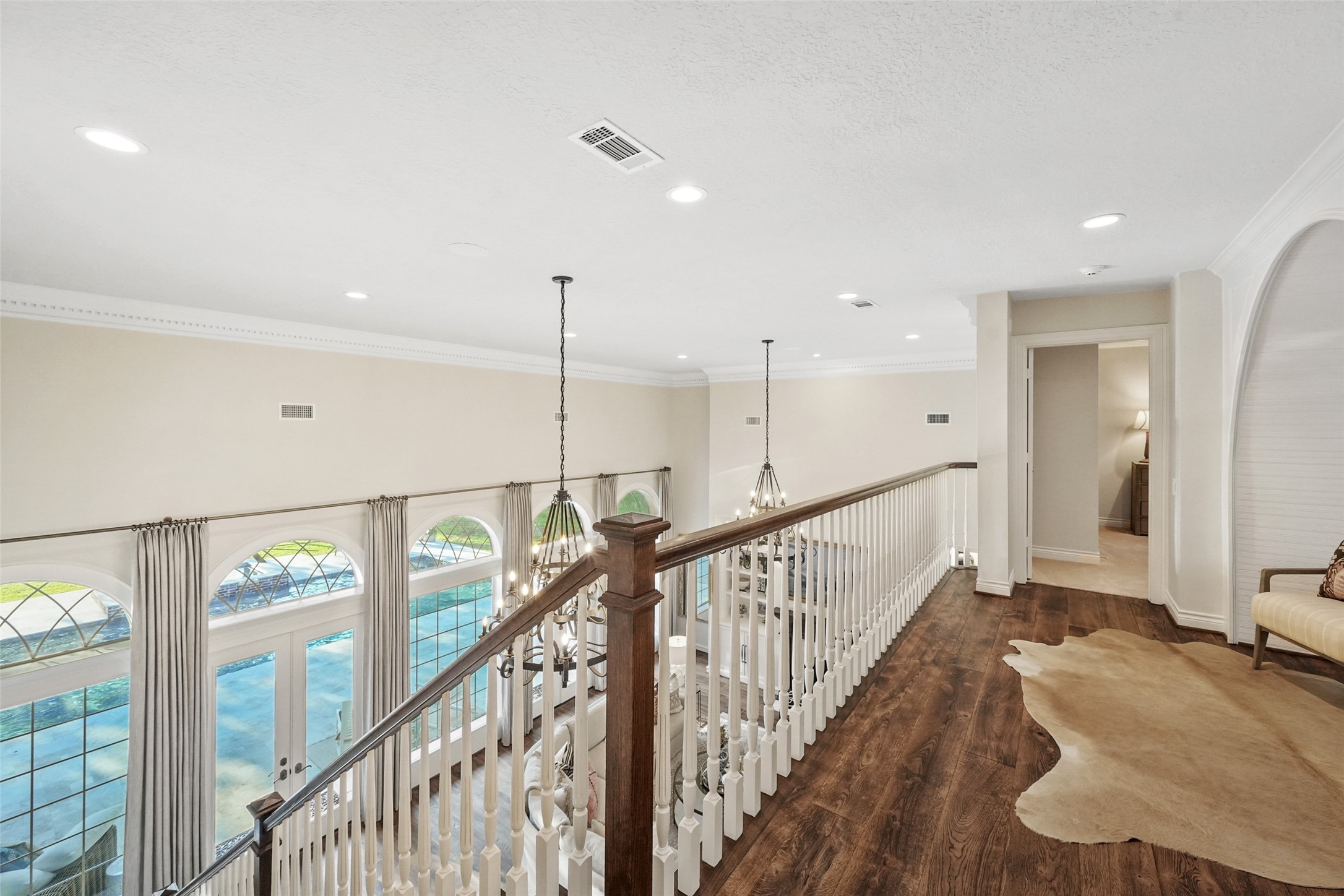 2207 Longmire Road Conroe, TX 77304 - Photo 26 of 46 a view of an entryway with stairs