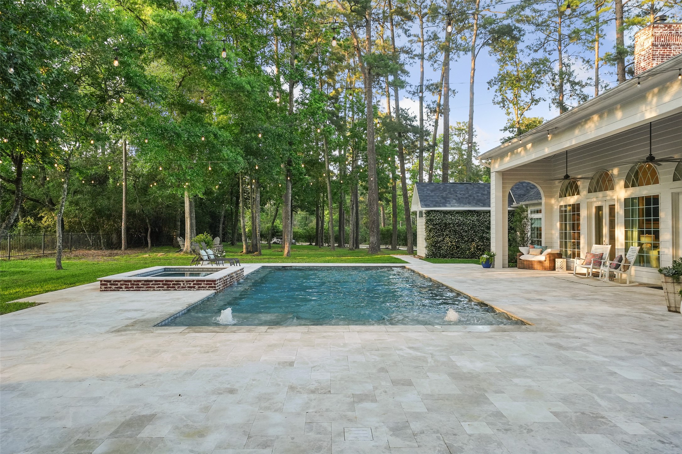 2207 Longmire Road Conroe, TX 77304 - Photo 36 of 46 a view of backyard of house with green space