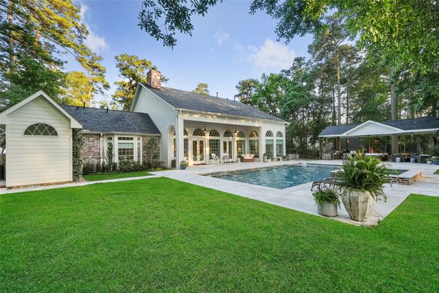 a front view of house with yard and patio