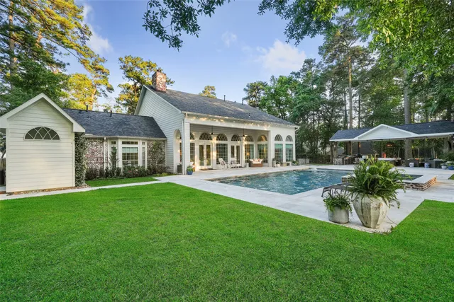 a front view of house with yard and patio