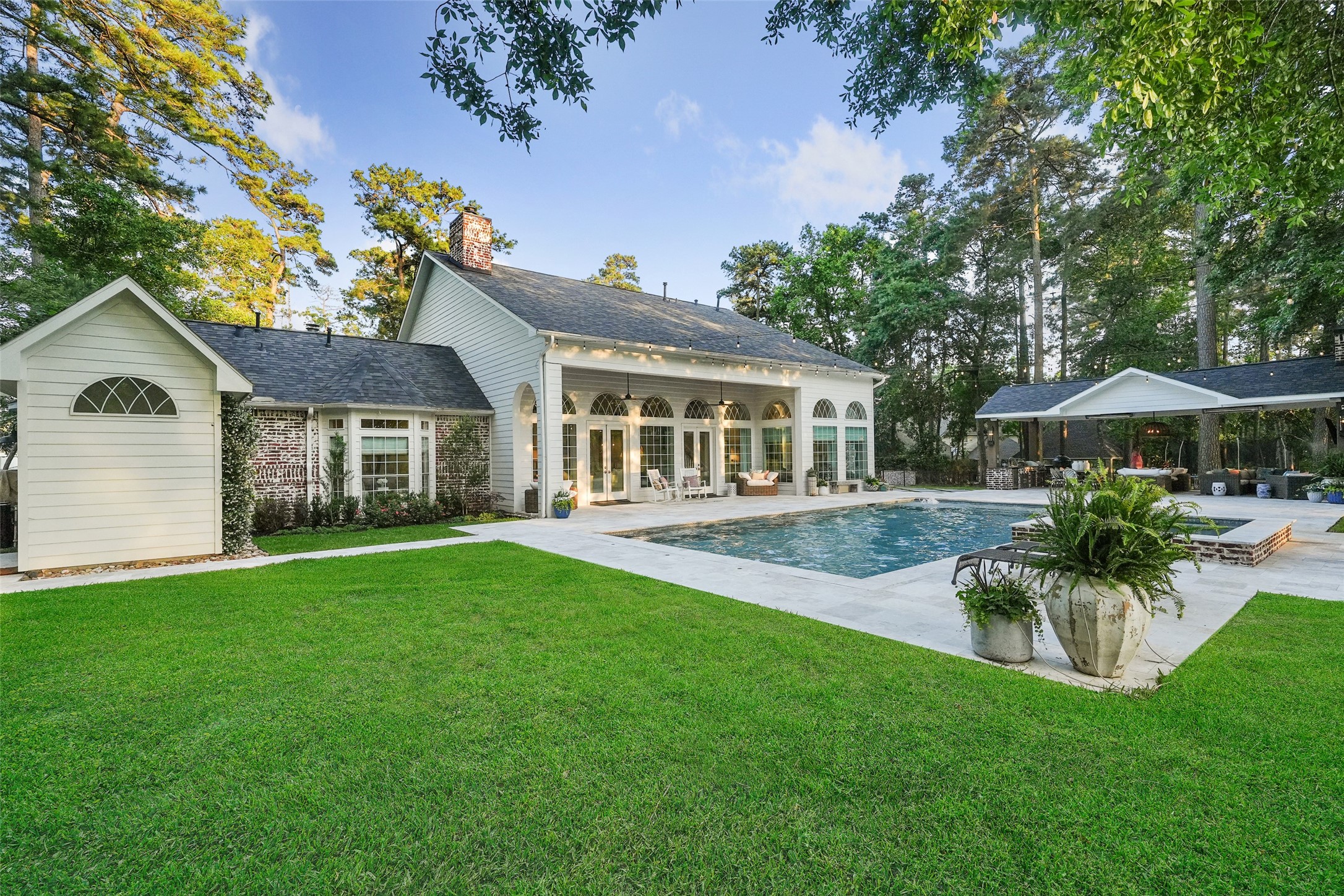 2207 Longmire Road Conroe, TX 77304 - Photo 46 of 46 a front view of house with yard and patio