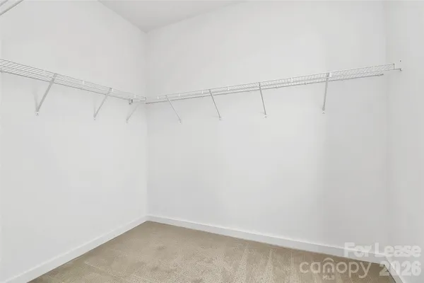 a view of a room with racks on the wall