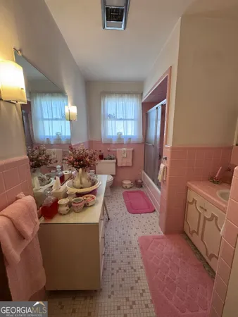 a living room with furniture a window and a couch