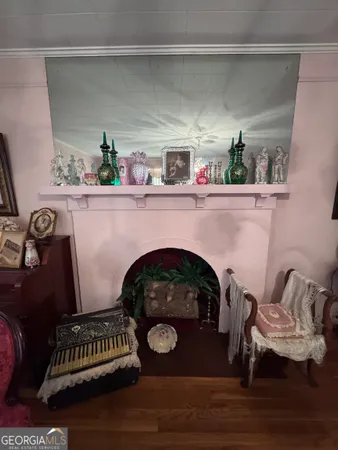 a kitchen with a table and a chandelier