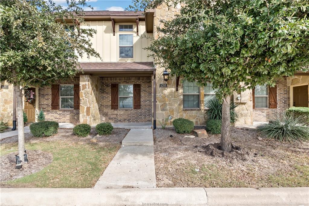 4295 Commando Trail College Station, TX 77845 - Photo 1 of 25 a front view of a house with garden