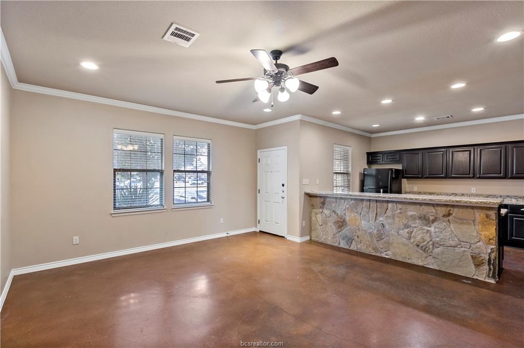 4295 Commando Trail College Station, TX 77845 - Photo 6 of 25 a view of kitchen with a sink cabinets and window