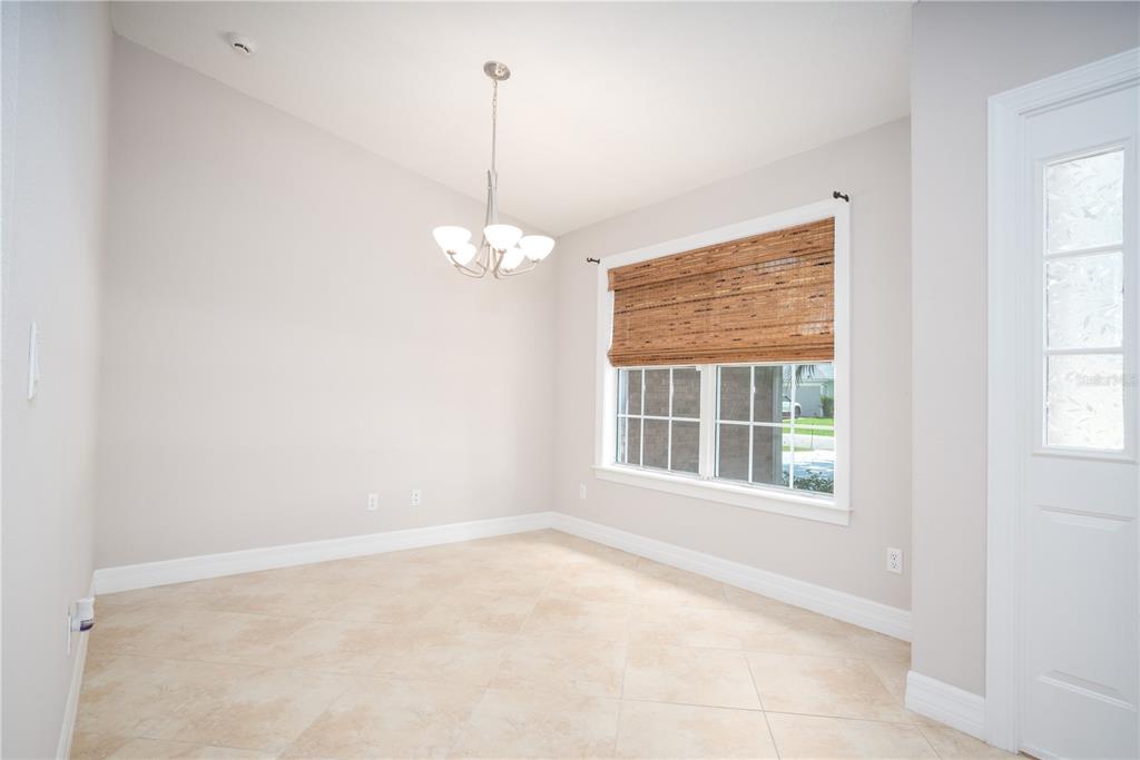 29 Rybark Lane Palm Coast, FL 32164 - Photo 20 of 41 a view of an empty room with a window