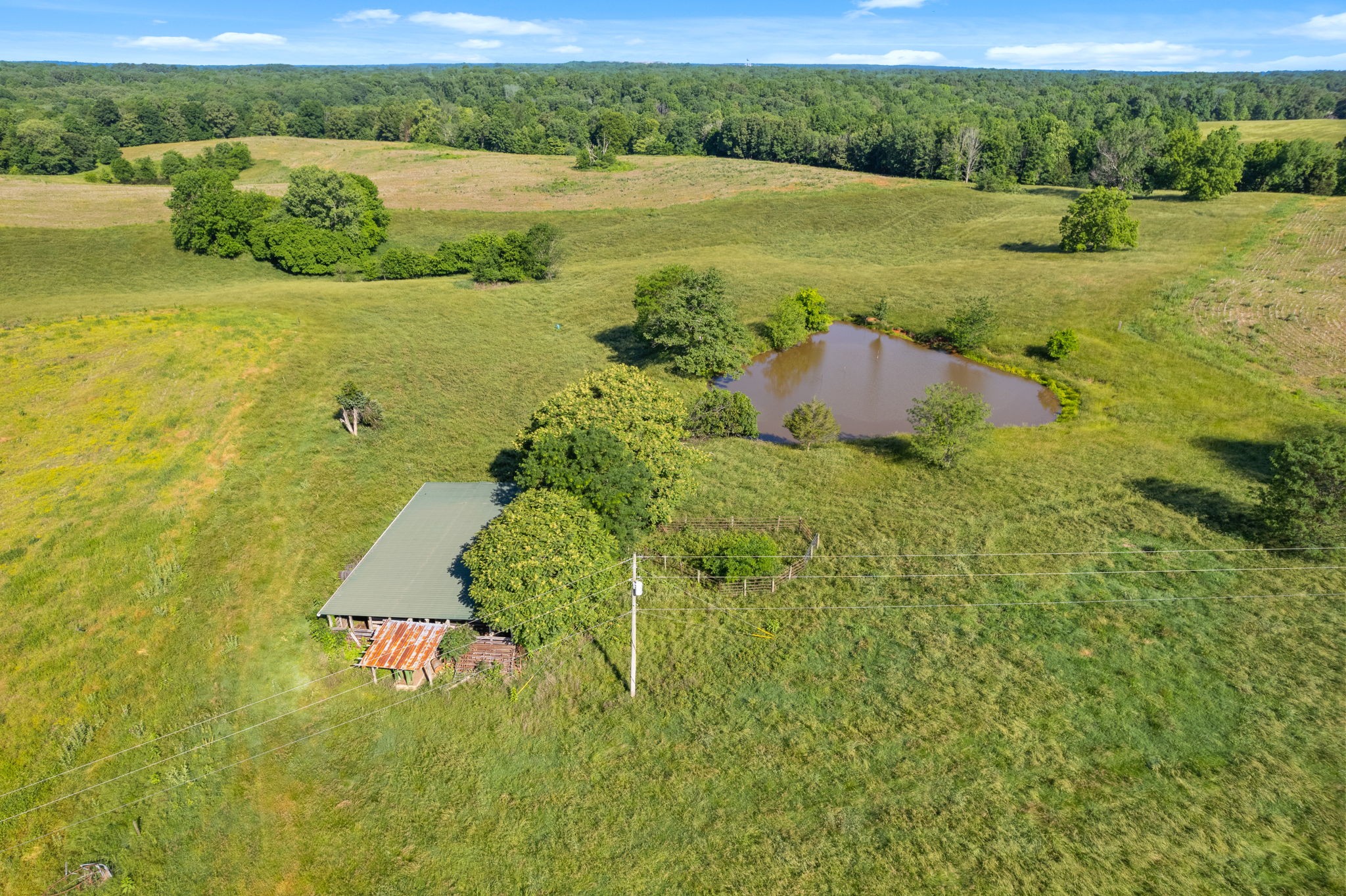 0 Happy Hills Acre Road Woodlawn, TN 37191 - Photo 15 of 32 a view of a lake with a yard