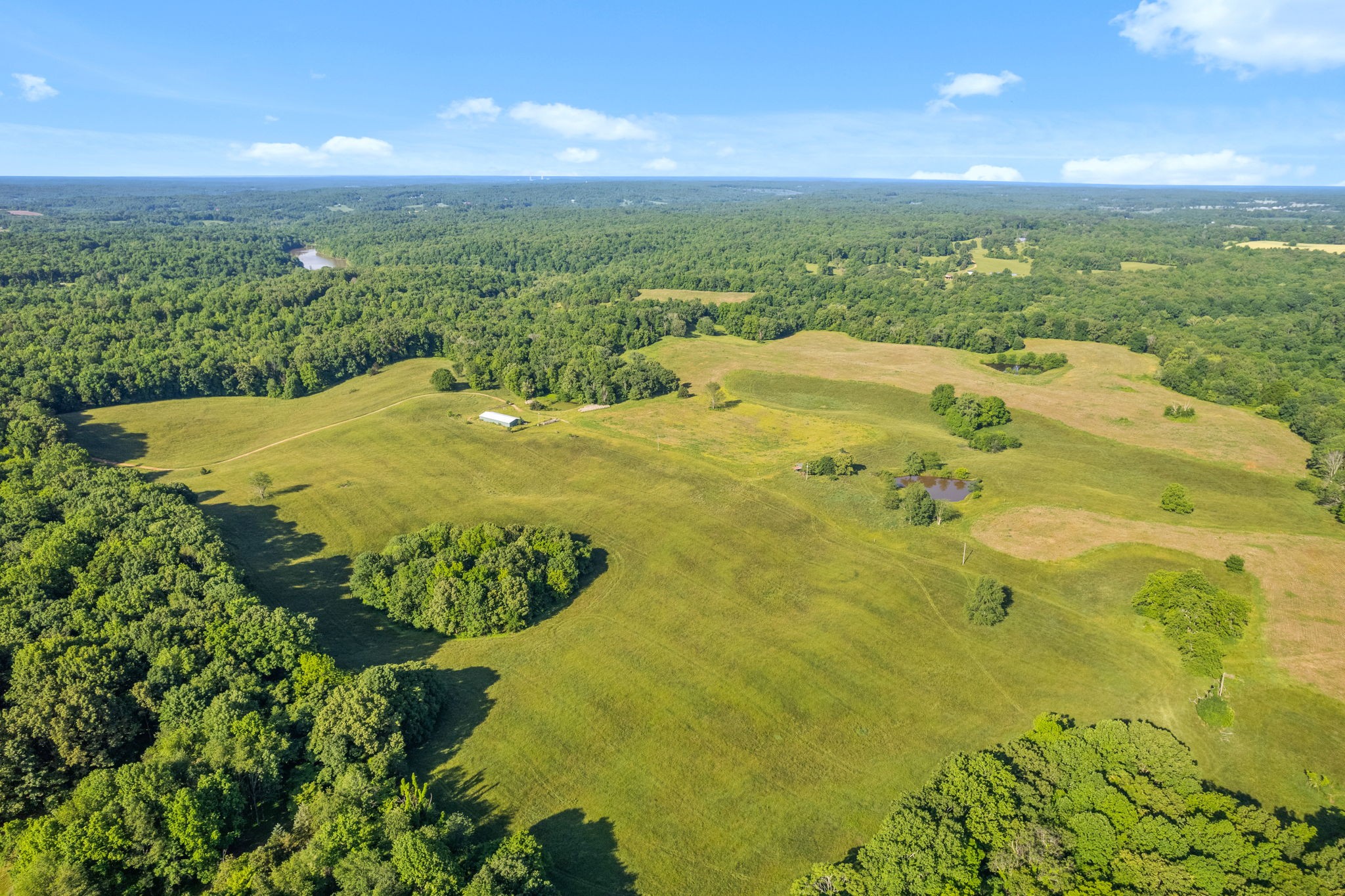 0 Happy Hills Acre Road Woodlawn, TN 37191 - Photo 22 of 32 a view of a lake with a mountain