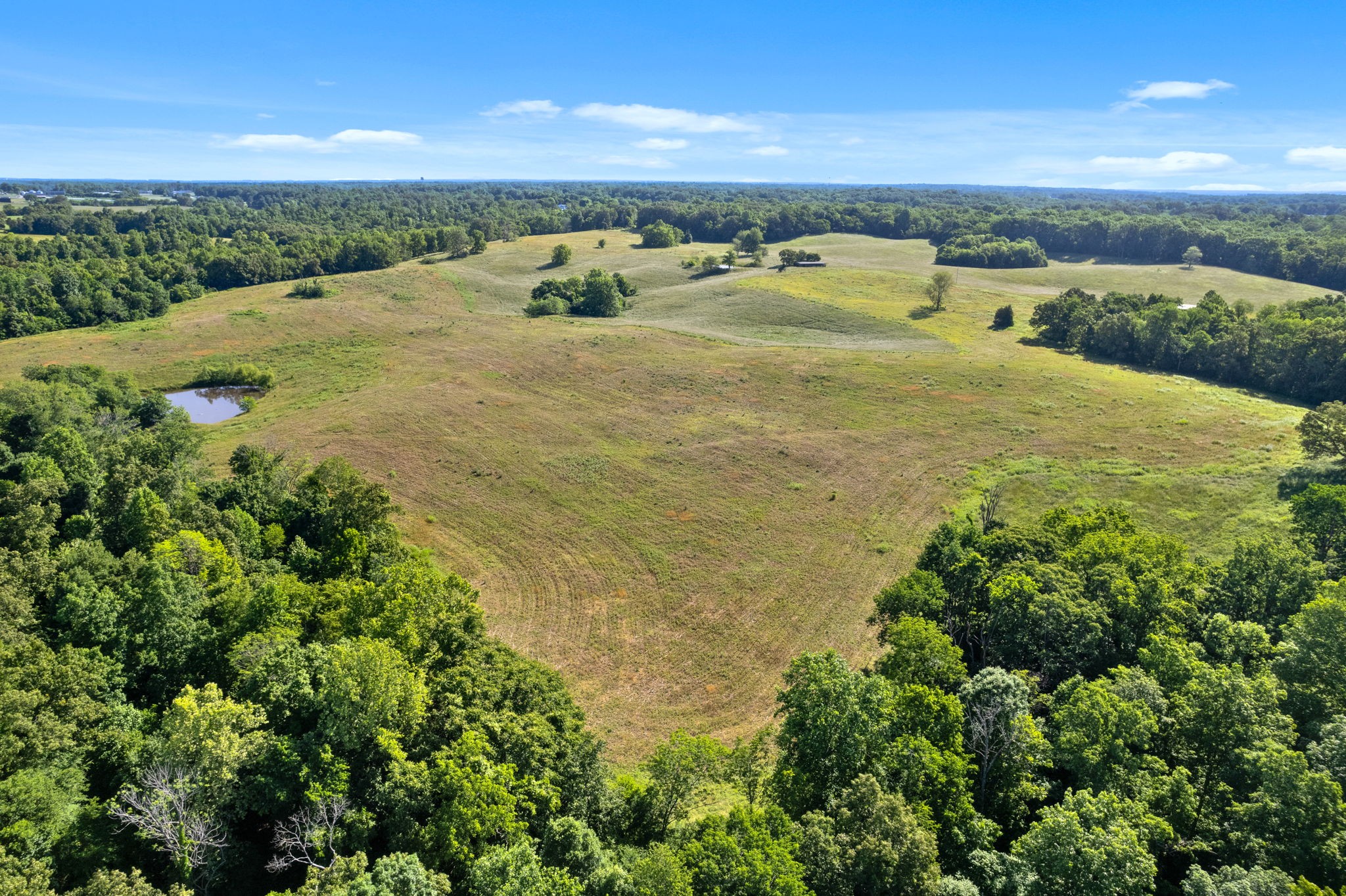 0 Happy Hills Acre Road Woodlawn, TN 37191 - Photo 24 of 32 a view of a lake with a city
