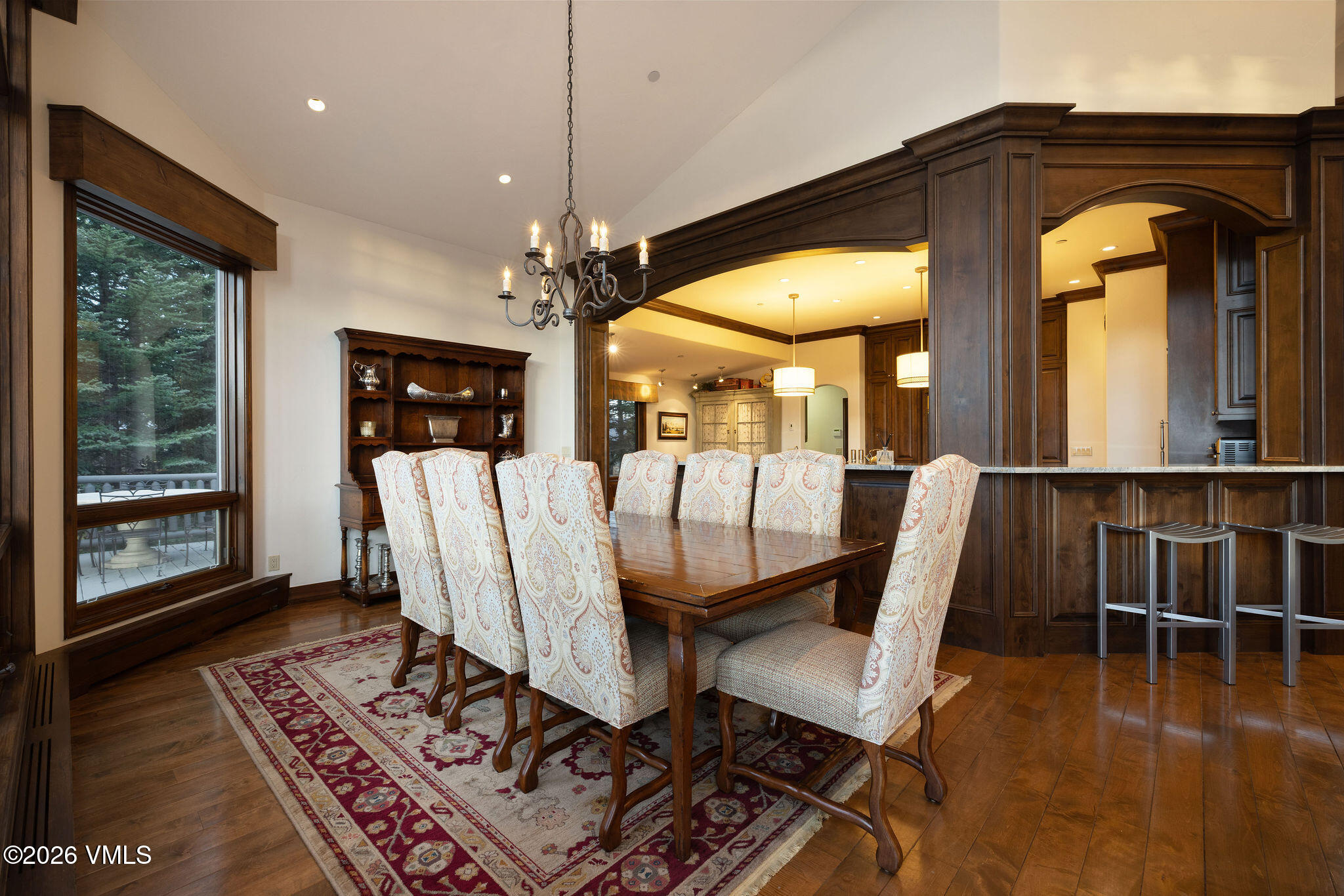 102 Saddle Ridge Loop Edwards, CO 81632 - Photo 5 of 29 a view of a dining room with furniture window and wooden floor